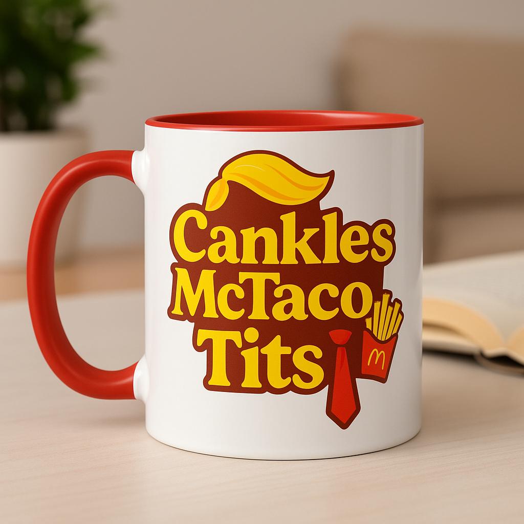 White ceramic 11oz mug with red handle and interior featuring bold yellow text “Cankles McTaco Tits” with Trump-inspired golden hair, red tie, and French fries graphic. Satirical political humor design for liberals, placed on a wooden table with blurred plant and book in background.