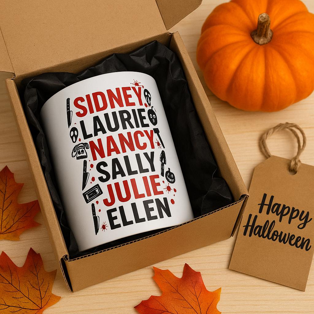 Final Girls slasher movie mug in a kraft paper gift box with black tissue paper, surrounded by autumn leaves and pumpkin decor, styled as a spooky Halloween gift.