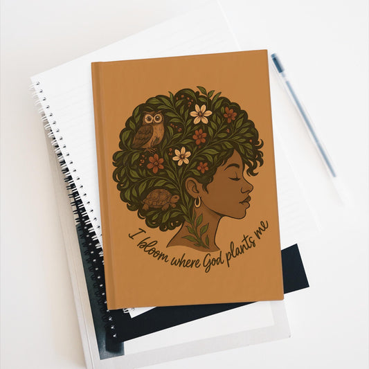 Afrocentric Christian hardcover journal in warm tan color featuring Black woman profile with floral hair, owl, turtle, and affirmation text I bloom where God plants me.
